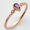 14KR 0.10CTW DIAMOND RING WITH 0.18CT PURPLE