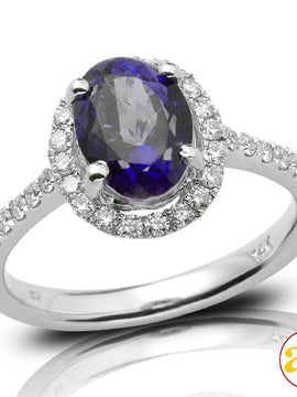 14KW 0.40CTW DIAMOND RING WITH 2.73CT OVAL TANZANI